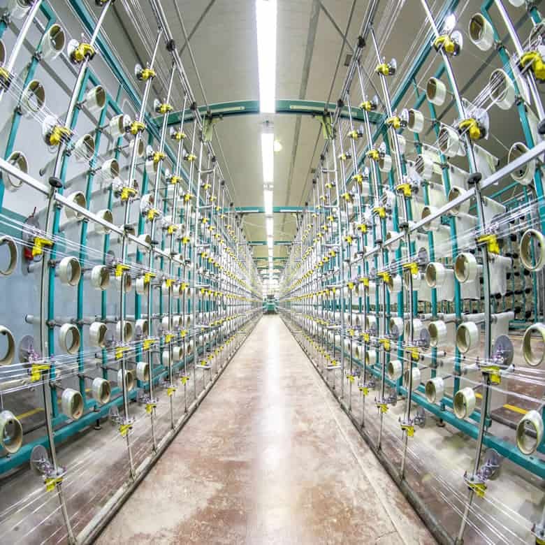 Textile Manufacturing — Building real-time visibility across mixed-generation textile machines.
